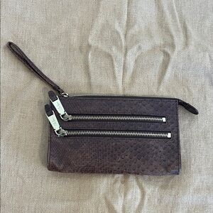 Cole Haan Brown Textured Leather Wristlet zippers pockets.
